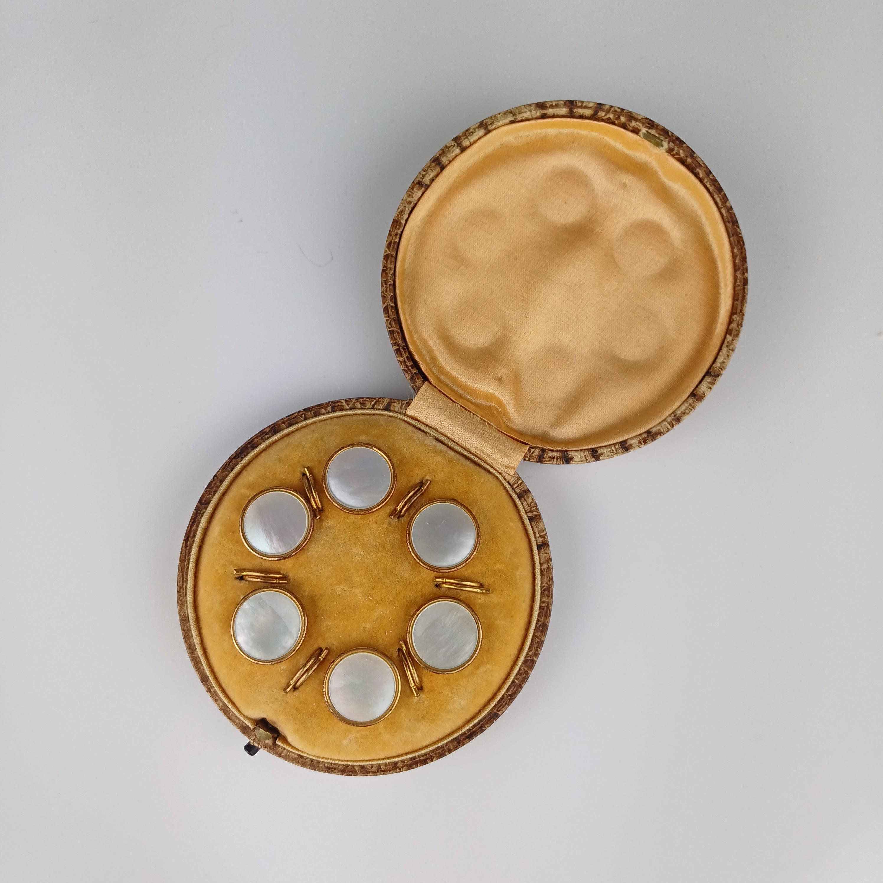 Edwardian set of Mother of Pearl and brass buttons