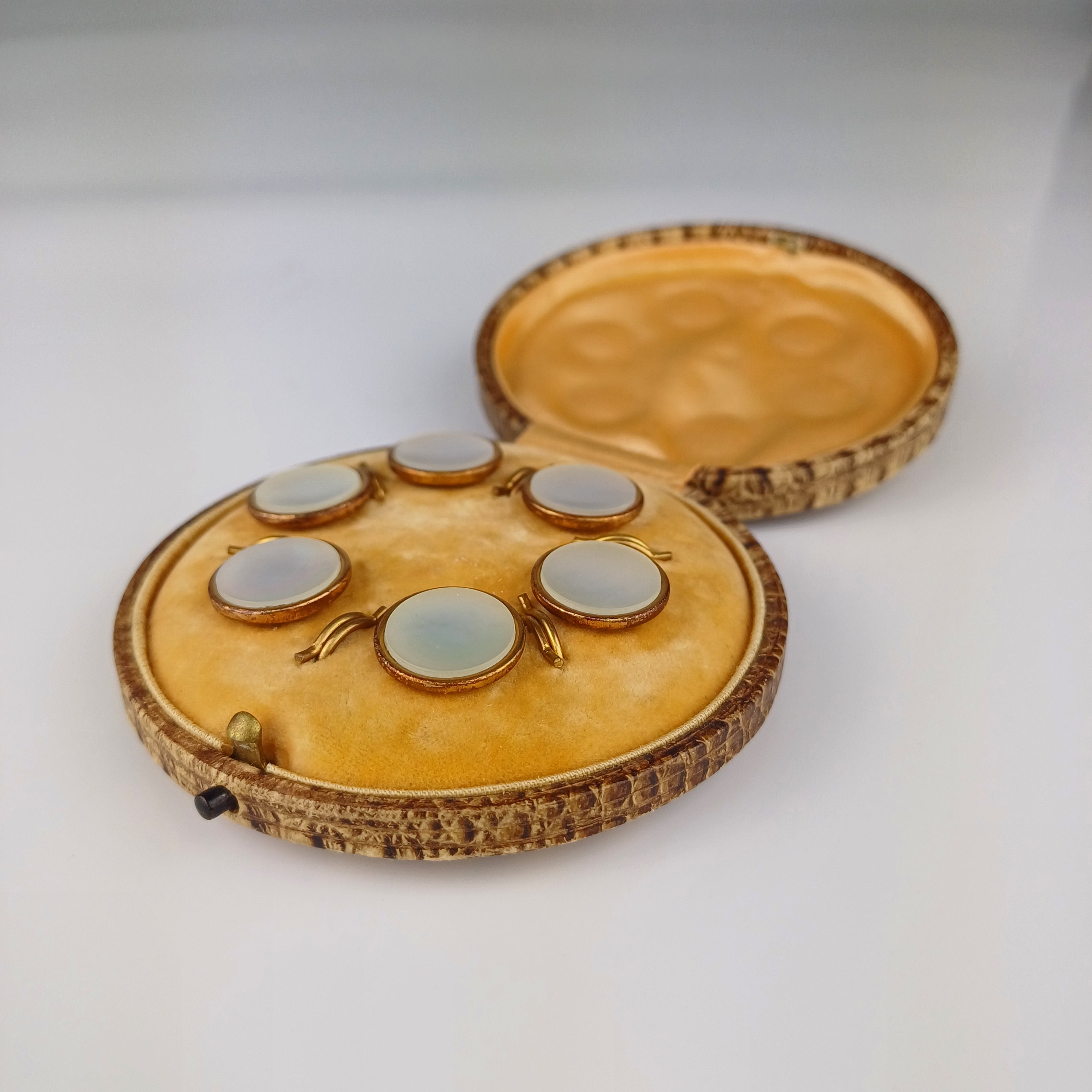 Edwardian set of Mother of Pearl and brass buttons