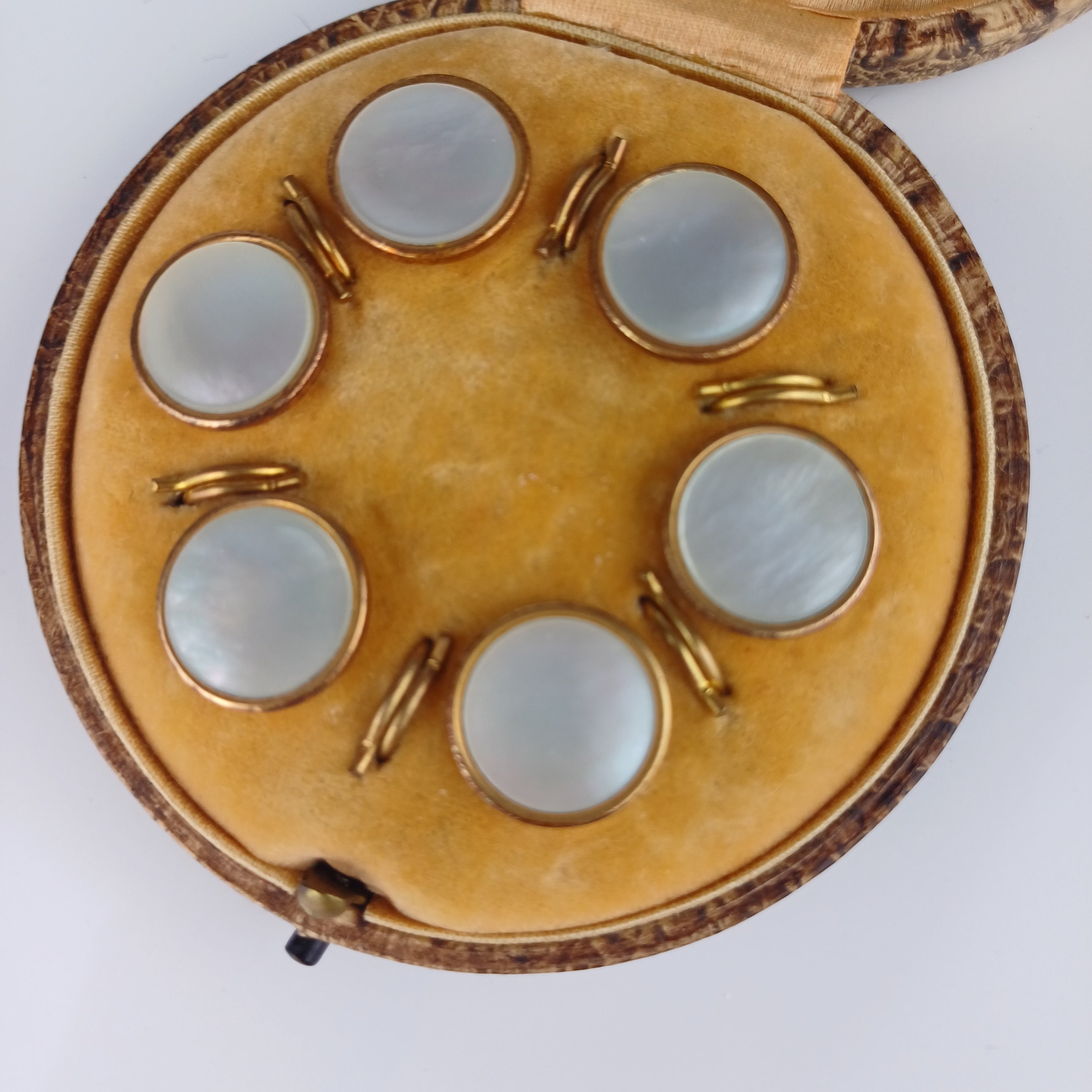 Edwardian set of Mother of Pearl and brass buttons