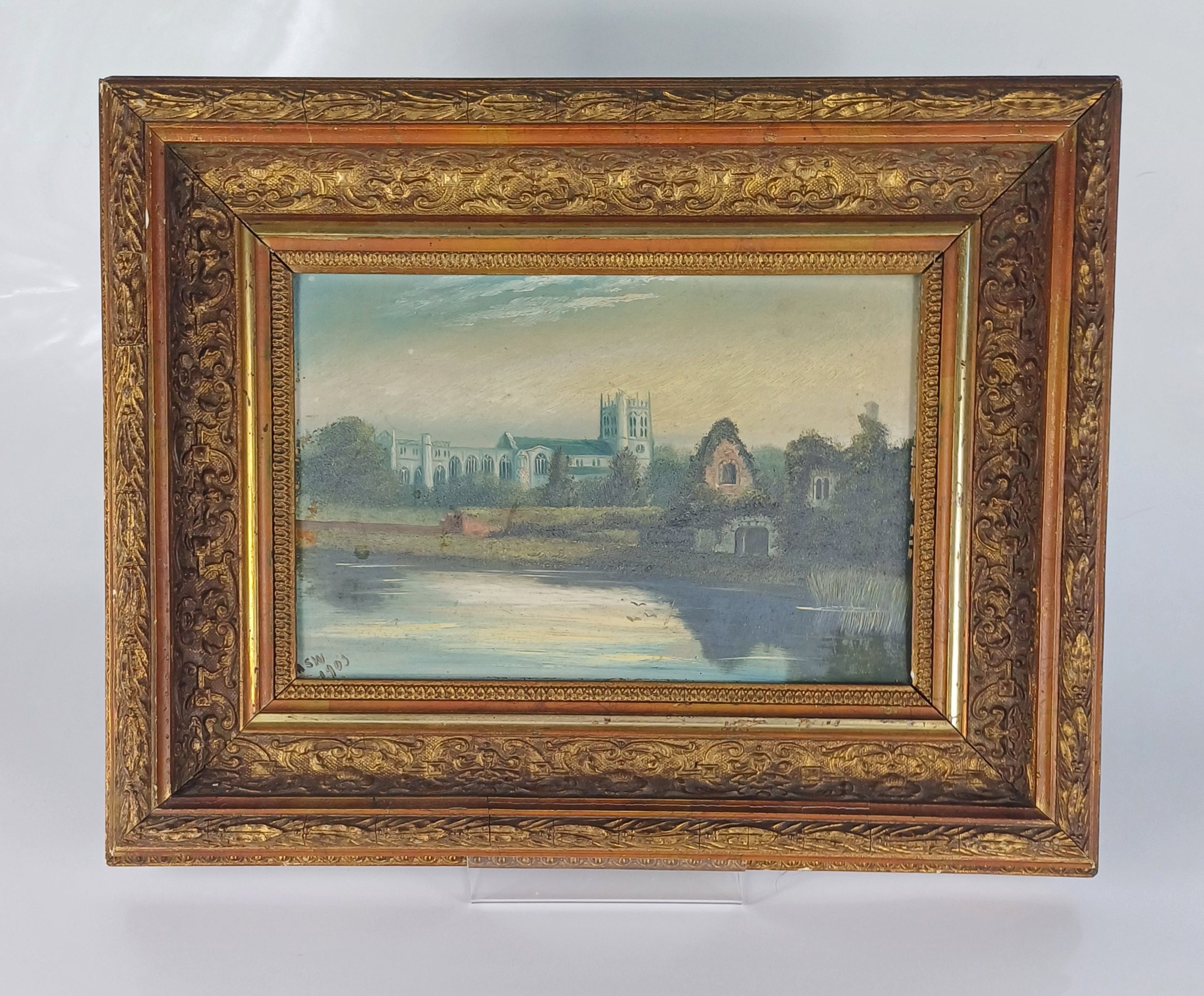 Painting on board of Christchurch Priory and the Norman House signed and dated 1905